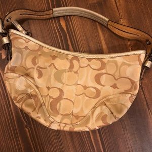 Small coach bag in shades of gold